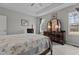 Bright and spacious main bedroom with a dresser, television, and plenty of natural light at 240 Northview Dr, Middlesex, NC 27557