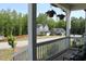 Inviting front porch view showcases the serene neighborhood and well-maintained landscaping at 240 Northview Dr, Middlesex, NC 27557