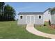 A walkway leads to the storage shed, offering convenient access to the property at 240 Northview Dr, Middlesex, NC 27557