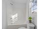 Bright bathroom showcasing a clean, well-lit shower and tub at 2613 Lilymount Dr, Raleigh, NC 27610