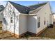 Home exterior showing vinyl siding and foundation at 2613 Lilymount Dr, Raleigh, NC 27610
