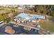 Aerial view of a community pool and playground featuring ample parking for residents' enjoyment at 2914 Lake James Dr, Fuquay Varina, NC 27526