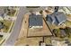 Aerial view of the backyard with a wood fence, patio set, and fire pit at 2914 Lake James Dr, Fuquay Varina, NC 27526