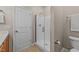 Bathroom featuring a sleek glass-enclosed shower and a white toilet at 2914 Lake James Dr, Fuquay Varina, NC 27526