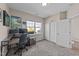 Cozy bedroom with neutral walls, plush carpet, and a large window overlooking the outdoors at 2914 Lake James Dr, Fuquay Varina, NC 27526