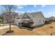 Well-maintained home with stone accents, a two-car garage, and a tidy front lawn at 2914 Lake James Dr, Fuquay Varina, NC 27526