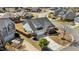 Aerial view of the home showcasing the front exterior, driveway, and surrounding landscaping at 2914 Lake James Dr, Fuquay Varina, NC 27526