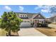Charming single-Gathering home with a well-manicured front yard, two-car garage, and inviting curb appeal at 2914 Lake James Dr, Fuquay Varina, NC 27526