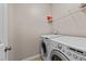 Bright laundry room featuring modern appliances, perfect for efficient household chores at 2914 Lake James Dr, Fuquay Varina, NC 27526