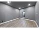 Spacious basement featuring modern vinyl flooring and recessed lighting, ready for customization at 3001 Valleystone Dr, Cary, NC 27519