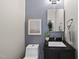 Stylish powder room featuring modern fixtures, a sleek vanity, and a contemporary aesthetic at 3001 Valleystone Dr, Cary, NC 27519