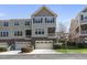 Three-story townhome features a two-car garage, a balcony, and neutral color scheme at 3001 Valleystone Dr, Cary, NC 27519