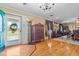 Bright foyer with hardwood floors, decorative accents, and a view to the outside porch at 3030 Old Stage S Rd, Erwin, NC 28339