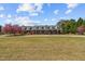 Charming front elevation of the house displaying a long, covered porch at 3030 Old Stage S Rd, Erwin, NC 28339
