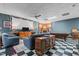 A large game room with a fireplace, a projector screen, a tv and a pool table at 3030 Old Stage S Rd, Erwin, NC 28339