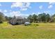 Large outbuilding in expansive backyard with plenty of room to expand at 3030 Old Stage S Rd, Erwin, NC 28339