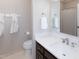 A cozy bathroom featuring a vanity with a dark wood finish and a clean, white countertop at 306 Lochside Dr, Cary, NC 27518