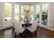 Bright dining area with natural light, views of the backyard, and seating for six at 306 Lochside Dr, Cary, NC 27518