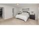 Inviting bedroom with a bed, a door to a walk in closet, and tasteful decor at 31 E Dentaires Way, Willow Springs, NC 27592