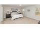 Cozy bedroom with carpet, with natural light, a comfortable bed, and tasteful decor at 31 E Dentaires Way, Willow Springs, NC 27592