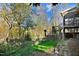 Secluded backyard with a stone path and lush greenery at 3308 Forest Mill Cir, Raleigh, NC 27616