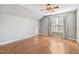 Bedroom with hardwood floors, neutral walls, and a window at 3308 Forest Mill Cir, Raleigh, NC 27616