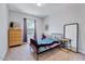 Serene bedroom with neutral walls, a twin bed, and soft natural light from the window and lots of space at 3417 Mission Olive Pl, New Hill, NC 27562