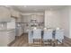 Bright kitchen featuring stainless steel appliances, granite countertops, and plenty of cabinet space at 402 Suhani Ln, Clayton, NC 27520