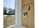 An entryway with wooden paneling and view of an exterior at 409 Alston St # 101, Raleigh, NC 27601