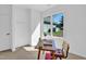Bright office space features a modern desk and large window, ideal for a productive work environment at 409 Alston St # 101, Raleigh, NC 27601