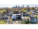 Aerial view of a modern home with cityscape in the background, showcasing its location within a vibrant neighborhood at 409 Alston St # 102, Raleigh, NC 27601