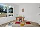Bright office space with modern desk, chair, and neighborhood view at 409 Alston St # 102, Raleigh, NC 27601