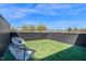 Stylish rooftop patio with faux grass and comfortable outdoor seating, perfect for relaxing or entertaining at 409 Alston St # 102, Raleigh, NC 27601