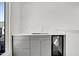 Wet bar with mini fridge, sink and counter space at 409 Alston St # 102, Raleigh, NC 27601