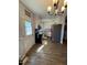 Practical kitchen layout featuring modern appliances, sufficient cabinet space, and an exterior door at 472 Cedar Ln, Mebane, NC 27302