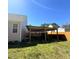 Covered patio with a spacious area that is perfect for entertaining or relaxing outdoors at 495 Cheves Rd # 495, Zebulon, NC 27597