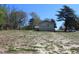 Large, open lot with plenty of space and mature trees, perfect for building or recreation at 5301 Daleview Dr, Raleigh, NC 27610