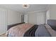Cozy bedroom featuring a leather bed frame, neutral walls, and a stylish ceiling fan at 539 N Oneil St, Clayton, NC 27520