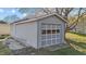 A detached single-car garage is next to the house and features a large window in the door at 539 N Oneil St, Clayton, NC 27520