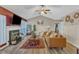 Inviting living room featuring modern decor, a cozy fireplace, and ample natural light at 5508 Lake Garden Ct, Raleigh, NC 27610
