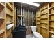 Unfinished basement bathroom area with utility sink, toilet, and open shelving for storage or customization at 5705 Dean Ave, Raleigh, NC 27616