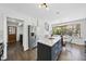 Bright kitchen featuring granite countertops, stainless steel appliances, and an eat-in breakfast nook with big windows at 5705 Dean Ave, Raleigh, NC 27616