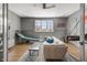 This room is a game room with a comfy couch, and basketball games at 5811 Shawood Dr, Raleigh, NC 27609