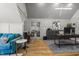 Open office space with modern lighting, hardwood floors, and stylish decor at 5811 Shawood Dr, Raleigh, NC 27609