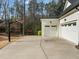 Two-car garage and basketball hoop in the driveway at 76 Gentry Dr, Pittsboro, NC 27312