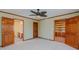 Spacious bedroom with adjoining bathroom and sitting room/office with built in shelves at 761 S Eighth St, Mebane, NC 27302