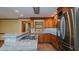 Spacious kitchen featuring a breakfast bar, stainless steel appliances and wood cabinets at 761 S Eighth St, Mebane, NC 27302