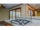An updated kitchen with stainless steel appliances, granite countertops and access to the backyard at 761 S Eighth St, Mebane, NC 27302