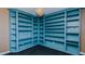Custom blue library boasts expansive built-in shelving and a unique chandelier at 761 S Eighth St, Mebane, NC 27302