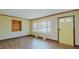 Bright living room with hardwood floors, bay window, and neutral paint at 761 S Eighth St, Mebane, NC 27302